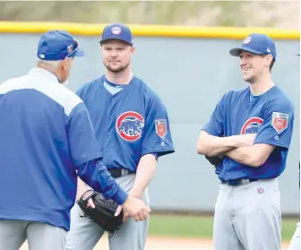  ?? | JOHN ANTONOFF/ FOR THE SUN- TIMES ?? Jon Lester had a 4.33 ERA last season after finishing second in NL Cy Young voting in 2016. Kyle Hendricks ( right) had a 3.03 ERA last year after finishing third in Cy Young voting in ’ 16.