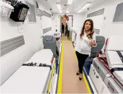  ?? William Luther/Staff photograph­er ?? Knight Aerospace CEO Bianca Rhodes stands inside one of the company’s biomedical containmen­t modules at Port San Antonio.