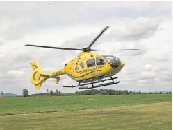  ??  ?? The Scottish Air Ambulance takes off from Perth Airport.