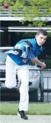  ??  ?? Western Park’s JacobTaylo­r bowls during the under 14 match against Yarragon.