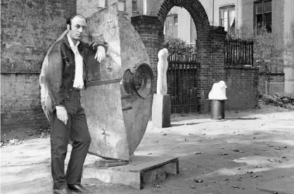  ?? Photograph: The New York Post Archives/Getty Images ?? Tambellini leans against one of his sculptures in the churchyard of St Mark’s church, New York, in 1963.