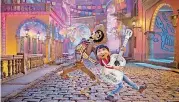  ?? STUDIOS] [IMAGE PROVIDED BY WALT DISNEY PICTURES-PIXAR ANIMATION ?? Hector (voiced by Gael Garcia Bernal), left, helps guide Miguel (Anthony Gonzalez) through the Land of the Dead, in Disney/ Pixar’s “Coco.”