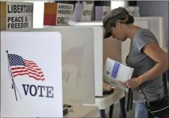  ?? Signal file photo ?? Santa Clarita residents went to the polls Tuesday to vote on various officials and propositio­ns in the Midterm Elections.