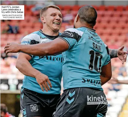  ?? SIMON WHITEHEAD/SW PHOTO/NEWS IMAGES ?? Hull FC’S Jordan Lane celebrates a try with Chris Satae