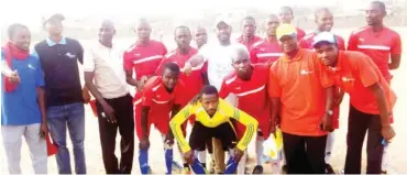  ??  ?? Kano State Fire Service Football Club and Sheka Queens United Football team pose for photograph during their match sponsored by KANO BF Suma in Kano recently