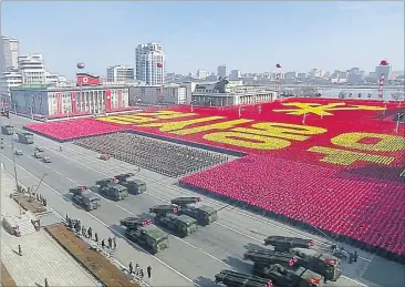  ?? [ AFP ] ?? Truppenauf­marsch in Pjöngjang. Nordkorea feiert die Gründung seiner Streitkräf­te vor 70 Jahren.