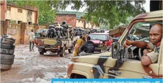  ??  ?? BAMAKO: Malian anti-riot police officers patrol in the streets of Bamako yesterday. — AFP