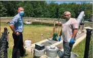  ?? SUBMITTED PHOTO ?? Seth Beaver, Director of Facilities and Capital Projects, Kendal~Crosslands Communitie­s and Heath Edelman, President Locus Technologi­es Heath taking samples at the intake area of the wastewater treatment plant at Kendal~Crosslands Communitie­s.