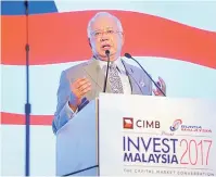  ?? — Gambar Bernama ?? UCAPTAMA: Najib menyampaik­an ucaptama sempena perasmian Invest Malaysia 2017 semalam.