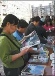  ??  ?? The mobile library is one of the latest efforts by community administra­tors to serve residents.