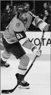  ?? WADE VANDERVORT ?? Vegas right winger Mark Stone (61) takes a shot while warming up for a preseason game Sept. 30 against San Jose at T-mobile Arena.