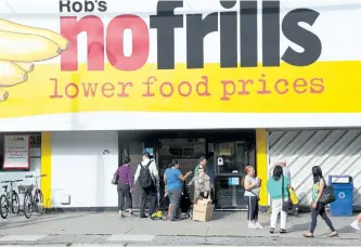  ?? TORONTO SUN FILES ?? A report from Boston Consulting Group says discount food retailers such as No Frills could play a bigger role in Canada and the U.S. Discount grocers currently make up only three per cent of market shares in Canada.