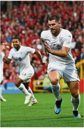  ?? — Reuters ?? Right on target: Burnley’s Sam Vokes celebratin­g after scoring against Aberdeen in the first-leg match of the Europa League qualifiers at the Pittodrie Stadium on Thursday.