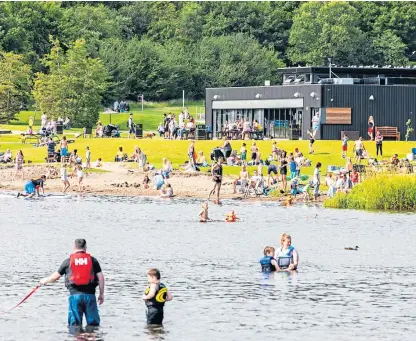  ??  ?? Visitors enjoying Lochore Meadows Country Park yesterday. Picture: Steve Brown.