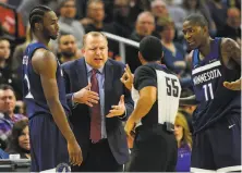  ?? Hannah Foslien / Getty Images 2017 ?? Tom Thibodeau (center) was head coach of the Timberwolv­es for three years during Wiggins’ (left) tenure in Minnesota.