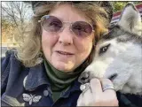  ?? COURTESY PHOTOS ?? After her son Ian Wrifford (left) died a year ago this week, Diane Lore (above) of Marietta inherited his beloved Siberian husky. It has been a long year of adjustment for both her and Yuki, united in their loss and heartbreak.