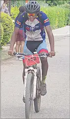  ?? Time (Hours) (Pics: Sanele Jele) ?? Winner of the Sisekelo MTB Cycle Challenge Kwanele Jele as he crosses the finish line. He won the race after clocking 2:51:06 hours. The race started and finished at Sisekelo High School yesterday.