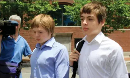  ??  ?? Alex Vavilov, right, and his older brother, Tim, leave a federal court after a bail hearing for their parents in Boston, Massachuse­tts, on 1 July 2010. Photograph: Elise Amendola/AP