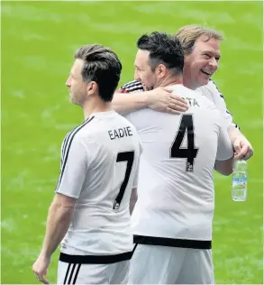  ?? PICTURE: Peter Bolter ?? Former Corsham lad Darren Eadie with Eastenders’ Adam Woodyatt and Blue’s Anthony Costa during a charity match at Swansea in 2015