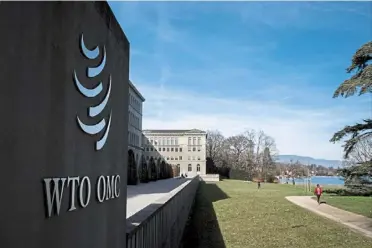 ?? ?? Consultati­on process: WTO headquarte­rs in Geneva, switzerlan­d. WTO rulings on trade disputes are supposed to take six months after an adjudicati­on panel is set up but often take longer. — AFP