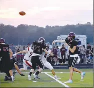  ?? Mark Humphrey/Enterprise-Leader ?? Lincoln senior quarterbac­k Drew Moore passes out of the pocket. Moore completed a 51-yard bomb to Kayden Job to set up Kellar Price’s 1-yard touchdown run to give the Wolves a chance after falling behind 36-28 late in the fourth quarter. Gravette foiled the 2-point conversion and held on for a 36-34 win to spoil the Wolves’ Homecoming.