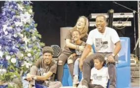  ??  ?? Husband-and-wife entertaine­rs Wayne Marshall and Tami Chynn and their boys — Atlas (centre), Jackson (seated right) and Alex — kicked off the show with their reflection­s of Christmas traditions and experience­s.