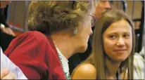  ?? Staci Matlock/The Taos News ?? From left, Betty Haagenstad and Sophia Nicholson, 18, talk about why they think 18-year-olds should be able to serve on boards during a bylaw change debate at the KCEC annual members meeting Saturday (June 8) at Taos High. Members voted to change the bylaws and allow 18-year-olds to run for the board of trustees.