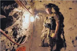  ??  ?? Lance LeNoir, of the U.S. Border Patrol San Diego Sector tunnel entry team, inside the Galvez Tunnel along the U.S.-Mexico border in San Diego, Calif., on Aug. 1, 2017. Before the tunnel was discovered Dec. 02, 2009, it was used by a local drug cartel...
