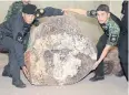  ??  ?? ILLEGAL HAUL: Authoritie­s show pieces of wood seized during the raid.