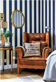  ??  ?? LEFT Kristina opted for striped wallpaper in the guest room. The leather armchair was bought at auction and the cushion is from Lexington