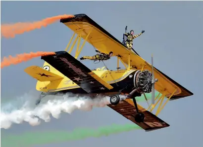  ?? PTI ?? The Scandinivi­an air show team performs at the 11th biennial edition of Aero India 2017 at Yelahanka Air base in Bengaluru on Tuesday. —