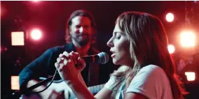  ?? WARNER BROS. PICTURES ?? The sound team for A Star Is Born was especially proud of the scene in which Bradley Cooper, left, and Lady Gaga sing Shallow in front of a live audience.