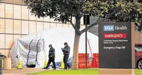  ?? Al Seib / Tribune News Service ?? Tents have been erected at the Saperstein Emergency Center entrance to the Ronald Reagan UCLA Medical Center as hospitals anticipate a wave of patients.