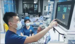  ?? PROVIDED TO CHINA DAILY ?? Above : Patients injured in the hotel fire receive treatment at Harbin First Hospital on Saturday.