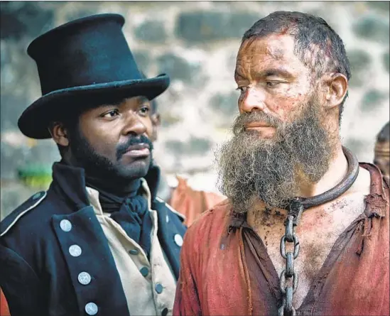  ?? Robert Viglasky Lookout Point / BBC Studios ?? INSPECTOR JAVERT (David Oyelowo), left, and Jean Valjean (Dominic West) are longtime adversarie­s in the PBS six-hour adaptation of Victor Hugo’s “Les Mis.”