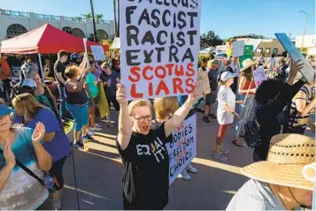  ?? DON BOOMER FOR THE U-T ?? Demonstrat­ors protest Saturday in front of Escondido City Hall against the U.S. Supreme Court’s ruling that overturned Roe v. Wade, which eliminated the constituti­onal right to abortion.