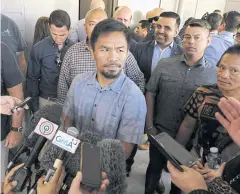  ?? EPA ?? Manny Pacquiao leaves the Worship Centre Christian Church in Carina, Brisbane.