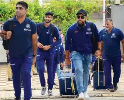  ?? — PTI ?? The Indian cricket team arrive at a hotel in Rajkot ahead of their second Twenty20 match against Bangladesh on Monday.