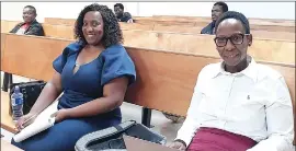  ?? ?? Deputy Master Lindelwa Magagula (R) and Assistant Master Joy Maphanga waiting for the commenceme­nt of the proceeding­s.