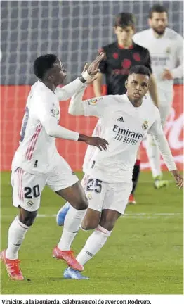  ?? Juanjo Martín / Efe ?? Vinicius, a la izquierda, celebra su gol de ayer con Rodrygo.