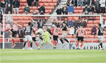  ??  ?? Lincoln score to retake the aggregate lead and crush Sunderland’s hopes of a return to the Championsh­ip.