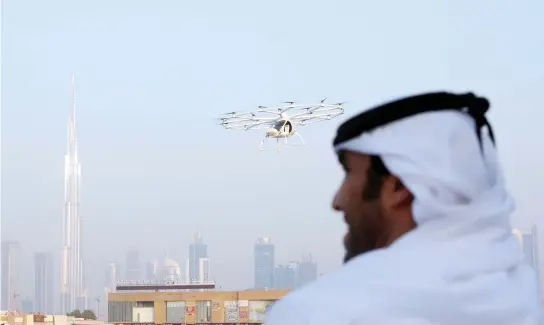  ??  ?? A prototype electric helicopter made a test flight in Dubai last week. (Reuters)