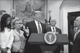  ?? EVAN VUCCI/AP PHOTO ?? President Donald Trump speaks during a signing ceremony for the “Economic Growth, Regulatory Relief, and Consumer Protection Act,” in the Roosevelt Room of the White House, Thursday in Washington. In a dramatic diplomatic turn, Trump on Thursday...