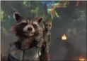  ?? MARVEL STUDIOS — DISNEY VIA AP ?? Rocket, voiced by Bradley Cooper, left, and Groot, voiced by Vin Diesel in a scene from Marvel’s “Guardians Of The Galaxy Vol. 2.”