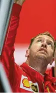  ?? Foto: dpa ?? Seite 2 Der Blick geht nach oben: Sebastian Vettel in Japan.