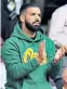  ??  ?? Hit performanc­e: Canadian rapper Drake (left) applauds Serena Williams (right) during her quarter-final victory on Centre Court