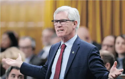  ?? JUSTIN TANG / THE CANADIAN PRESS ?? Minister of Natural Resources Jim Carr rises during Question Period in the House of Commons on Monday.