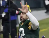  ??  ?? Green Bay Packers quarterbac­k Aaron Rodgers waves to spectators after a divisional playoff game against the Los Angeles Rams on Saturday, Jan. 16, in Green Bay, Wis. Rodgers played at Pleasant Valley High and Butte College.