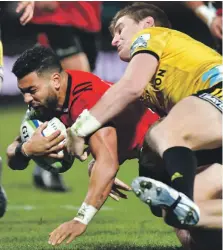  ?? AFP ?? Richie Mo’unga scores a try for the Crusaders during his match-winning semi-final performanc­e yesterday