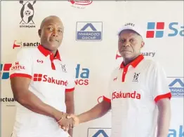  ?? ?? Highlander­s new second assistant Agent Sawu (left) being unveiled by the club’s secretary Morgen Dube yesterday